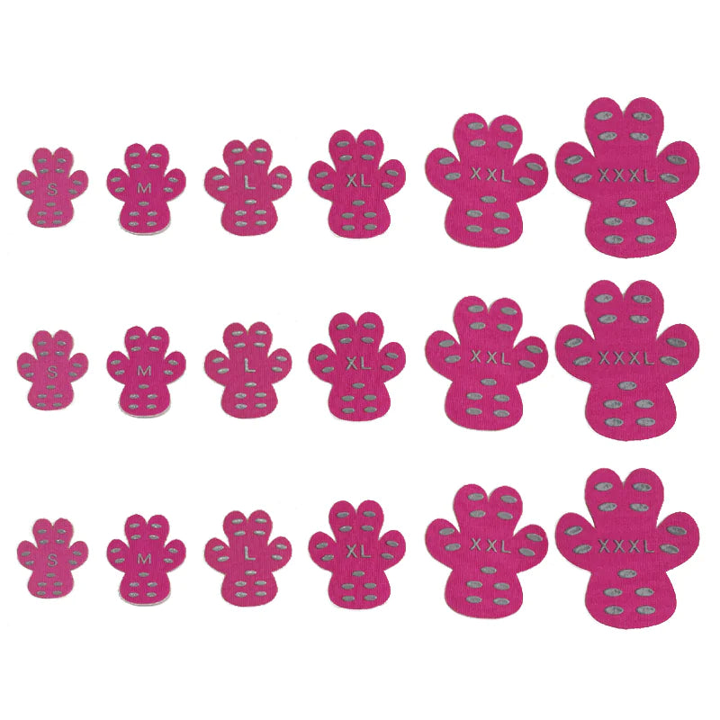 Pink paw-shaped non-slip pet stickers in various sizes from S to XXXL, arranged in rows.