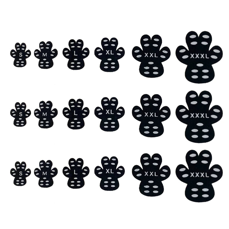 Assorted sizes of black paw decals with grip holes for pet protection, labeled S, M, L, XL, XXL, XXXL